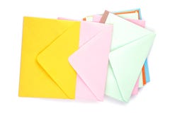 Many multicolored postal envelopes on a white isolated background. mail concept. royalty free stock images Many multicolored postal envelopes on a white isolated background. mail concept. royalty free stock images