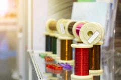Many new of colorful wire coil on table with flare for electric industrial work royalty free stock photos Many new of colorful wire coil on table with flare for electric industrial work royalty free stock photos