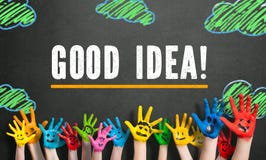 Many painted kids hands with smileys and the message `Good Idea!` royalty free stock photos Many painted kids hands with smileys and the message `Good Idea!` royalty free stock photos