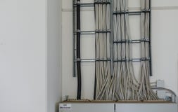 Many power cables lead to a fuse box royalty free stock photography Many power cables lead to a fuse box royalty free stock photography