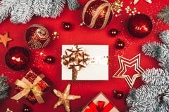 Many presents among sparkling Christmas decorations on red background. royalty free stock photos Many presents among sparkling Christmas decorations on red background. royalty free stock photos