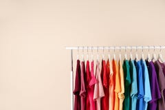 Many T-shirts Hanging In Order Royalty Free Stock Image