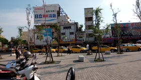 Many taxis, waiting for the next fare near the exit of Railway station stock photo Many taxis, waiting for the next fare near the exit of Railway station stock photo