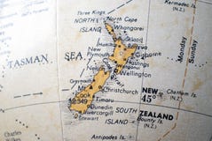 Map of New Zealand on a world globe stock photos Map of New Zealand on a world globe stock photos