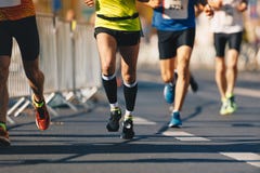 Marathon Running Race, People Feet On Autumn Road. Runners Run Urban Marathon In The Downtown Royalty Free Stock Photo