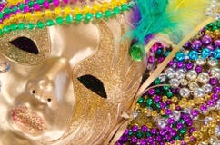 Mardi Gras-Perlen und -maske Stockfotografie Mardi Gras-Perlen und -maske Stockfotografie