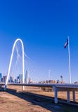 Margaret Hunt Hill Bridge with the Texas flag and Dallas skyline in the background stock photo Margaret Hunt Hill Bridge with the Texas flag and Dallas skyline in the background stock photo