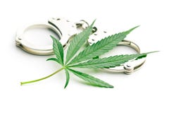 Marihuana kajdanki i liść obrazy royalty free Marihuana kajdanki i liść obrazy royalty free