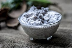 Marination milk of coconut with chills and spices with tomato stock image Marination milk of coconut with chills and spices with tomato stock image