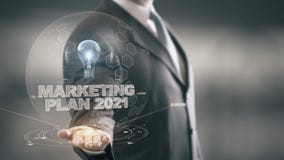 Marketingowy plan 2021 z żarówka holograma biznesmena pojęciem royalty ilustracja Marketingowy plan 2021 z żarówka holograma biznesmena pojęciem royalty ilustracja