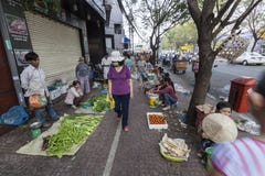 Marknad för morgongrönsakgata i Ho Chi Minh, Vietnam Royaltyfri Bild Marknad för morgongrönsakgata i Ho Chi Minh, Vietnam Royaltyfri Bild