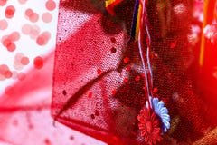 Martisor с румынскими tricolor элементами на красной предпосылке праздника Молдаванин и румынский символ весны и любов Martisor стоковое фото Martisor с румынскими tricolor элементами на красной предпосылке праздника Молдаванин и румынский символ весны и любов Martisor стоковое фото