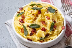 Mashed potatoes with crispy bacon and sage stock images Mashed potatoes with crispy bacon and sage stock images