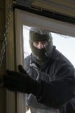 Masked Thief Breaking In Through Window Stock Images Masked Thief Breaking In Through Window Stock Images