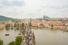 Mass of tourists walking on Charles bridge stock photo Mass of tourists walking on Charles bridge stock photo