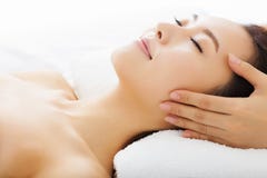 Massage of face for woman in spa stock photo Massage of face for woman in spa stock photo