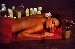Massage of woman in spa salon. Luxary interior oriental therapy. stock photography Massage of woman in spa salon. Luxary interior oriental therapy. stock photography