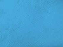 The material of the cement wall texture, painted in blue vector illustration The material of the cement wall texture, painted in blue vector illustration