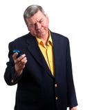 Mature Businessman Staring At Cell Phone, Isolated Royalty Free Stock Image Mature Businessman Staring At Cell Phone, Isolated Royalty Free Stock Image