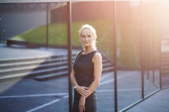 Mature busineswoman standing in front of building stock photos Mature busineswoman standing in front of building stock photos