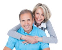 Mature couple on pilates ball Royalty Free Stock Images Mature couple on pilates ball Royalty Free Stock Images