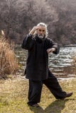 Mature man practicing Tai Chi discipline outdoors stock images Mature man practicing Tai Chi discipline outdoors stock images