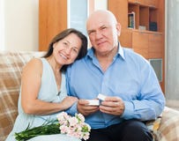 Mature man presenting smiling woman jewel royalty free stock photos Mature man presenting smiling woman jewel royalty free stock photos