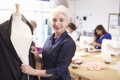 Mature Students Studying Fashion And Design stock image Mature Students Studying Fashion And Design stock image