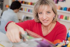 Mature students studying fashion and design stock photo Mature students studying fashion and design stock photo