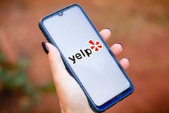May 10, 2021, Brazil. In this photo illustration the Yelp logo seen displayed on a smartphone screen