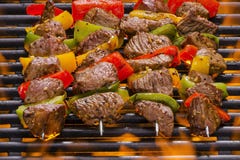 Meat Kabobs On A Hot Flaming Grill Stock Images