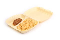 Meat rissoles with rice in food container. On a white background Stock Image Meat rissoles with rice in food container. On a white background Stock Image