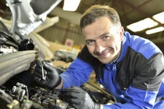 Mechanic working on car reparations stock photos Mechanic working on car reparations stock photos