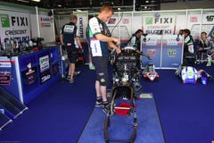 Mechanical working on Suzuki GSX-R1000 Team Fixi Crescent Suzuki Superbike WSBK stock photo Mechanical working on Suzuki GSX-R1000 Team Fixi Crescent Suzuki Superbike WSBK stock photo