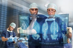Medical. Doctors in a medical facility looking at digital screen Medical. Doctors in a medical facility looking at digital screen