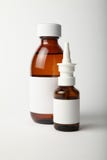 Medical glass bottle and spray mockup. Empty template isolated on white background stock photography Medical glass bottle and spray mockup. Empty template isolated on white background stock photography