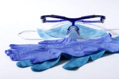 Medical protective equuipment, nitrile gloves, blue, mask for the face, goggles, on a white background, horizontal,