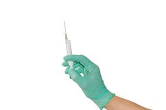 Medical syringe in a male hand wearing a medical glove stock image Medical syringe in a male hand wearing a medical glove stock image