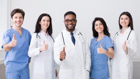 Medicine Concept. Happy Doctors Showing Thumbs Up stock image Medicine Concept. Happy Doctors Showing Thumbs Up stock image