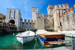 Medieval castle Scaliger in old town Sirmione on lake Lago di Garda, northern Italy stock photo Medieval castle Scaliger in old town Sirmione on lake Lago di Garda, northern Italy stock photo