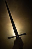 Medieval sword silhouette at backlighting