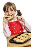 Meisje dat koekjes eet royalty-vrije stock foto's Meisje dat koekjes eet royalty-vrije stock foto's
