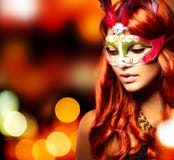 Meisje in een masker van Carnaval royalty-vrije stock foto's Meisje in een masker van Carnaval royalty-vrije stock foto's