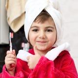Meisje met een tandenborstel stock afbeeldingen Meisje met een tandenborstel stock afbeeldingen