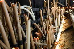 Melted candles in the city of Fatima Portugal. Candles lit as a sign of Christian faith stock images Melted candles in the city of Fatima Portugal. Candles lit as a sign of Christian faith stock images