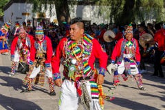 Men dancing at the festival of indigenous people in South America, north Chile