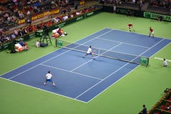 Men Doubles Tennis Match Stock Photography