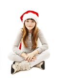 Menina no chapéu vermelho de Santa imagens de stock Menina no chapéu vermelho de Santa imagens de stock