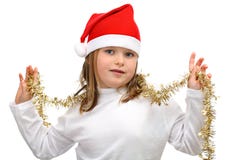 Menina no chapéu vermelho de Santa com as correntes douradas isoladas Foto de Stock Menina no chapéu vermelho de Santa com as correntes douradas isoladas Foto de Stock