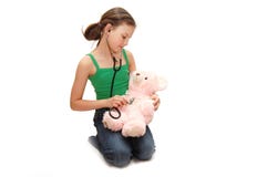 A menina o adolescente trata um urso fotografia de stock A menina o adolescente trata um urso fotografia de stock